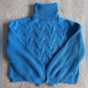 Blue cable knit sweater